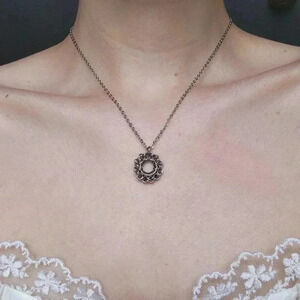 Classic silver circle necklace with a small silver chain